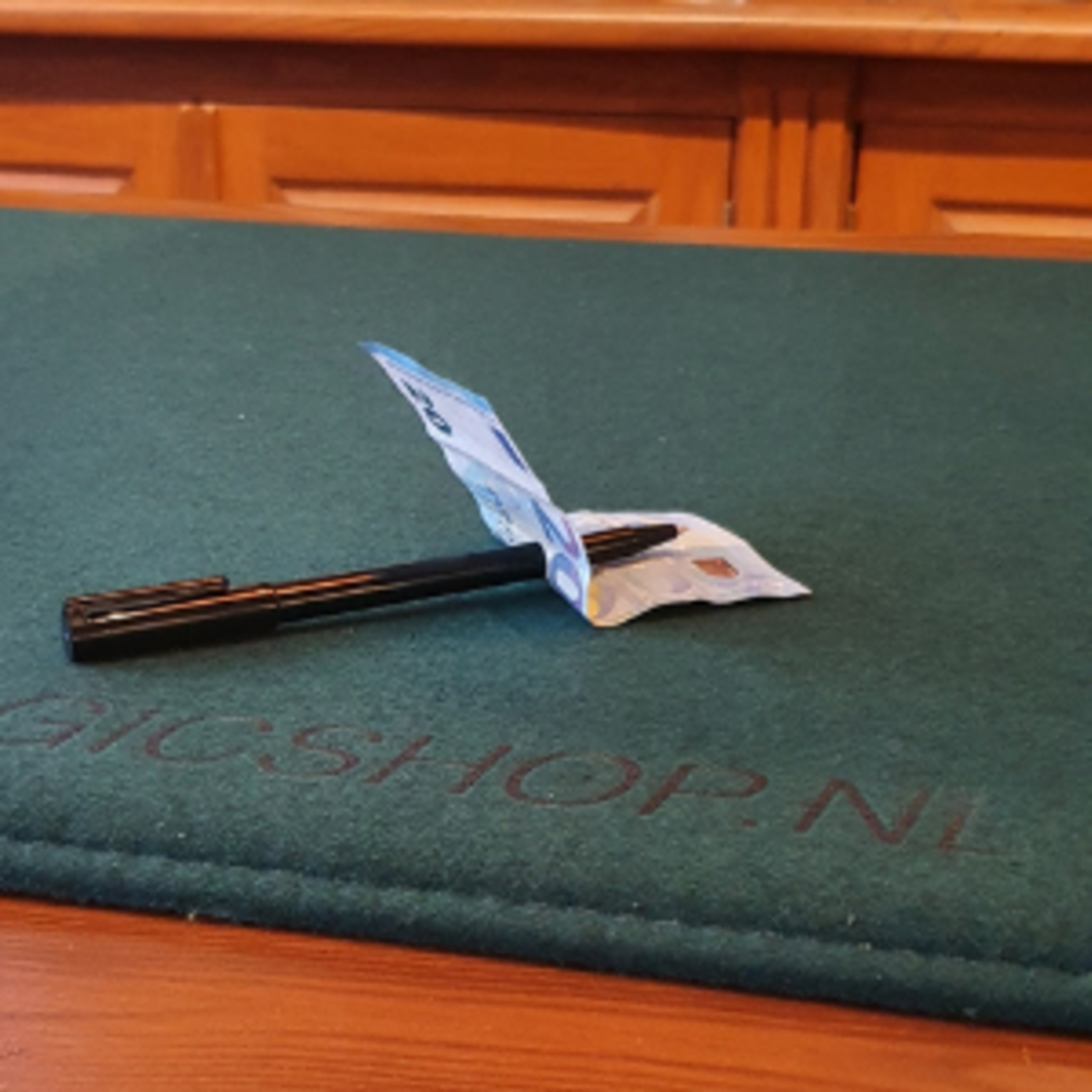 Pen thru bill illusion