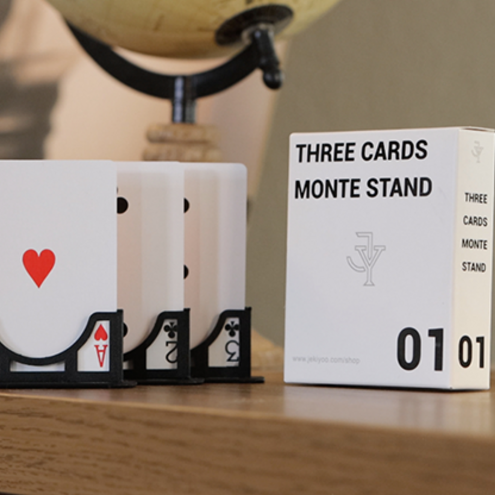 Three Cards Monte Stand RED by Jeki Yoo