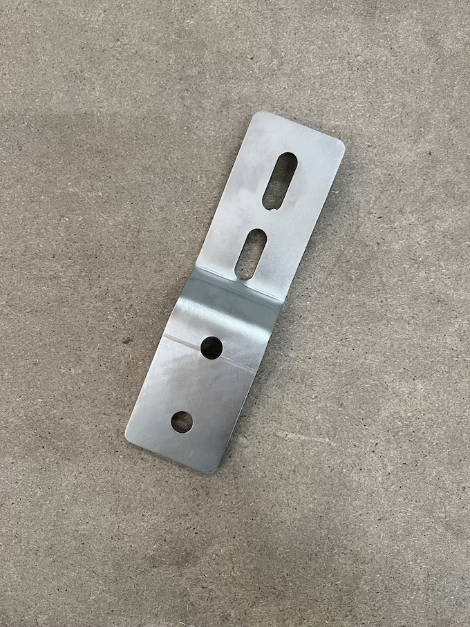 Extension support for front mirror Scania NG