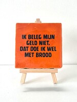 Tegel Quotes ik beleg mijn geld niet, dat doe ik wel met brood - oranje