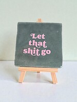 Tegel Quotes let that shit go - zeegroen