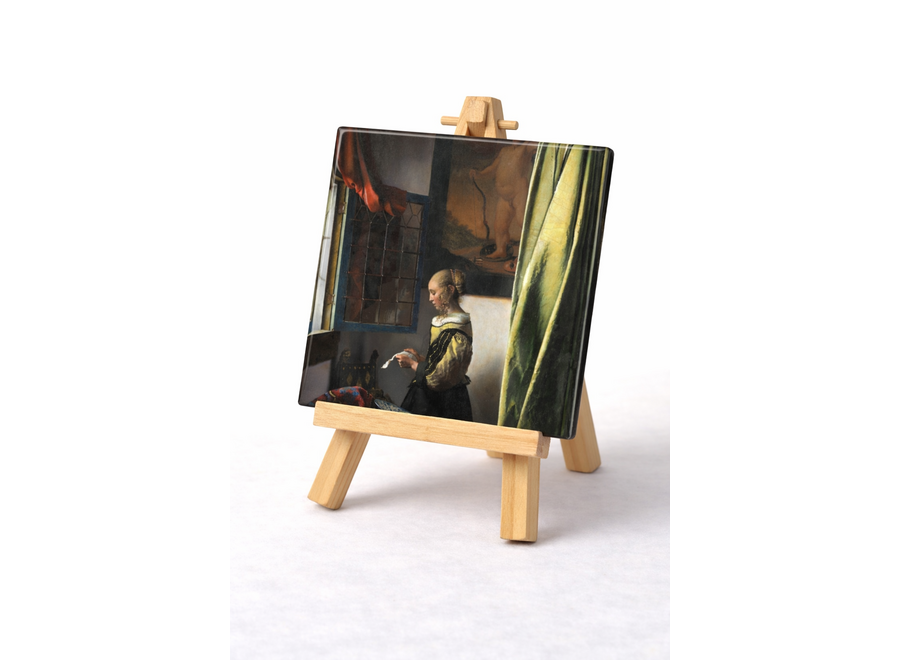 Tegel Brieflezend meisje bij het venster