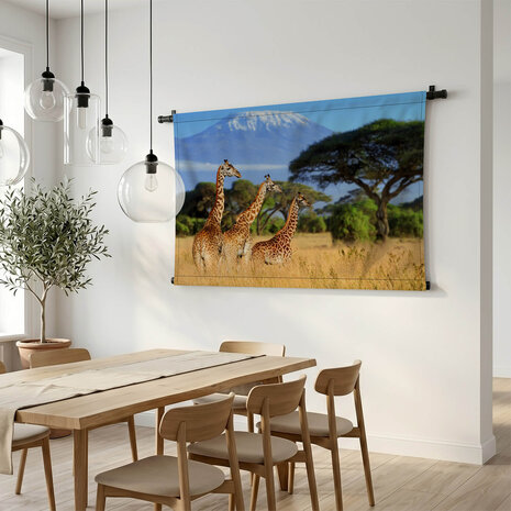 Drie giraffen bij de Kilimanjaro berg