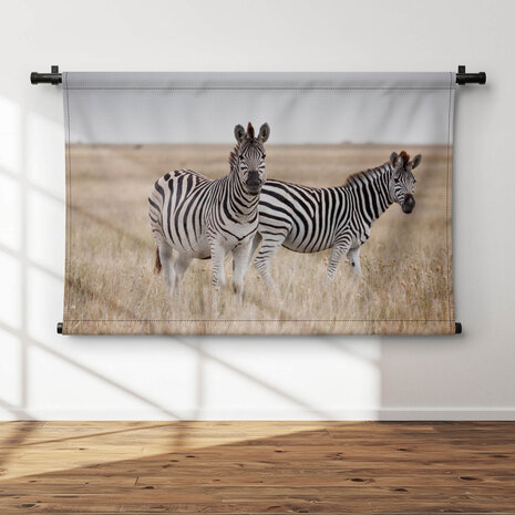 Sierlijke zebra's op de savanne