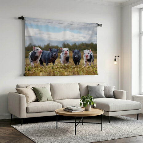 Zwarte en gevlekte varkens op een rij