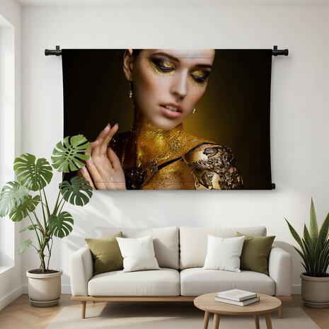 Kunstmake-up met gouden schittering