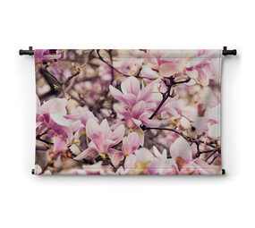 Takken vol bloeiende magnolia