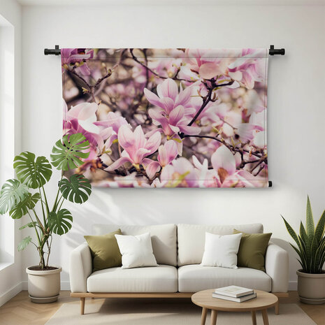Takken vol bloeiende magnolia