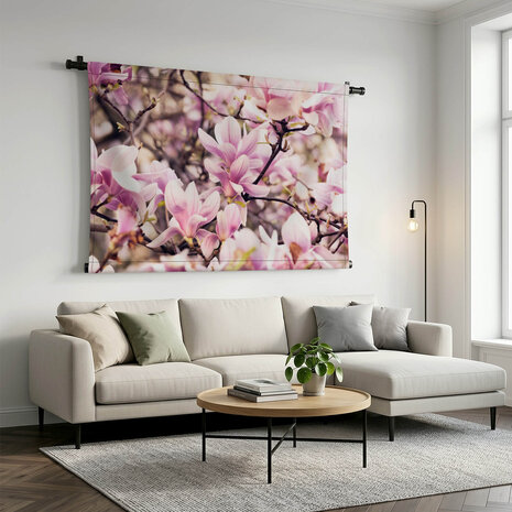 Takken vol bloeiende magnolia