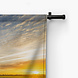 Houten windmolen bij zonsondergang