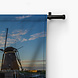 Verbazingwekkende zonsondergang boven de molens van Kinderdijk