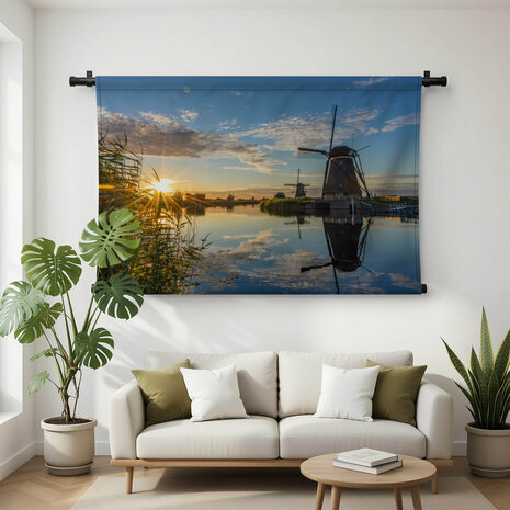 Verbazingwekkende zonsondergang boven de molens van Kinderdijk