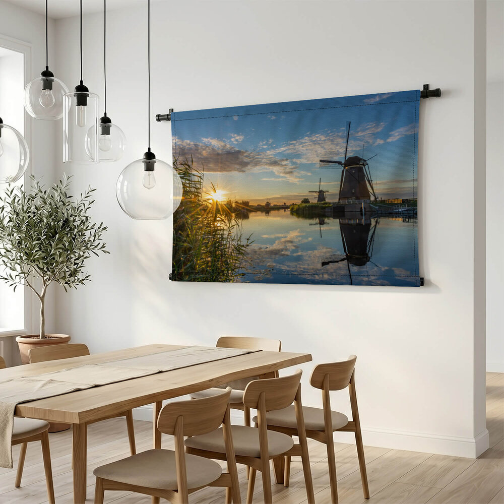 Verbazingwekkende zonsondergang boven de molens van Kinderdijk