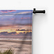 Uitzicht vanaf de duinen over het strand en de Noordzee