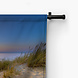 Uitnodigende zonsondergang op het strand in Zeeland