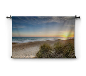 Zonsondergang op het strand