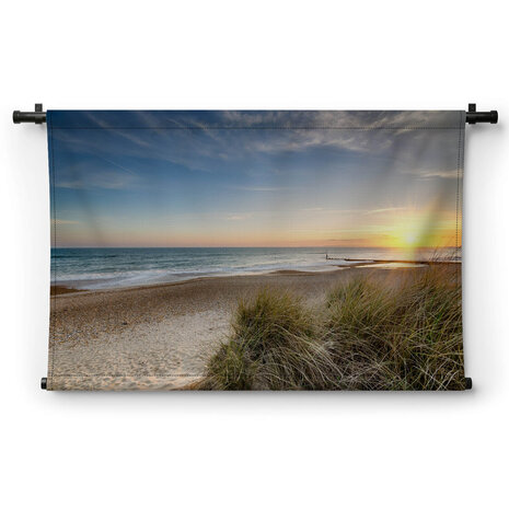 Zonsondergang op het strand