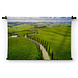 Slingerend door de groene velden van Toscane