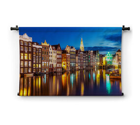Zomeravond met uitzicht op iconische Amsterdamse gebouwen