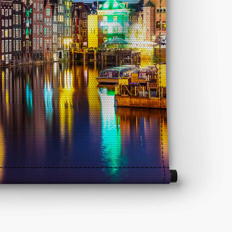 Zomeravond met uitzicht op iconische Amsterdamse gebouwen