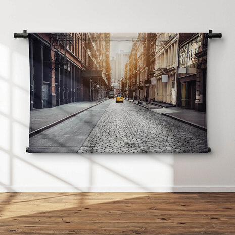 Straat in de wijk SoHo bij zonsondergang