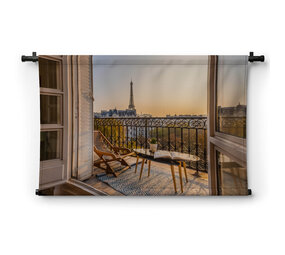 Sfeervol Frans balkon bij zonsondergang