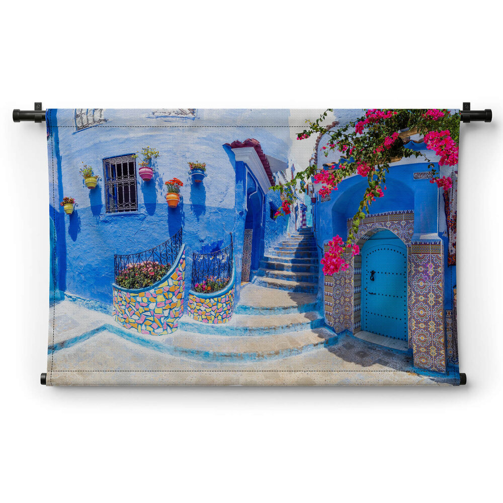 Pittoresk pleintje met blauwe huizen in Chefchaouen