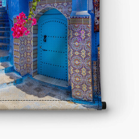 Pittoresk pleintje met blauwe huizen in Chefchaouen