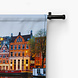 In avond verlichte Amsterdamse huizen