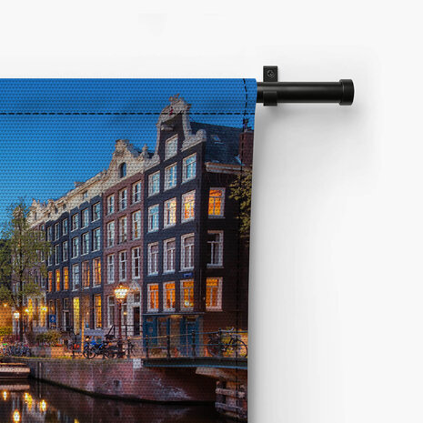 Nachtelijk stadsgezicht in Amsterdam
