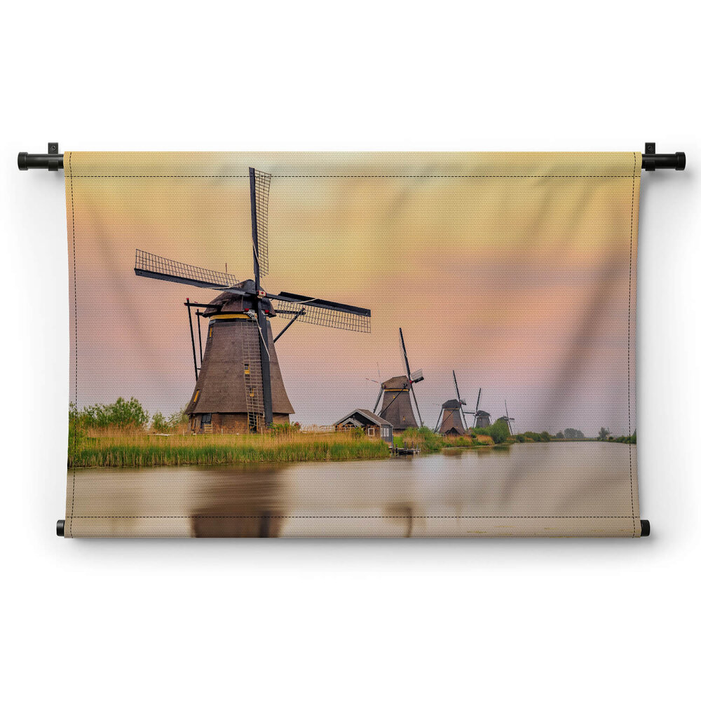 Windmolens in Kinderdijk bij zonsondergang