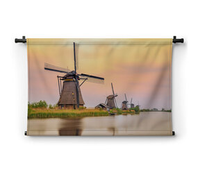 Windmolens in Kinderdijk bij zonsondergang
