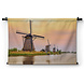 Windmolens in Kinderdijk bij zonsondergang