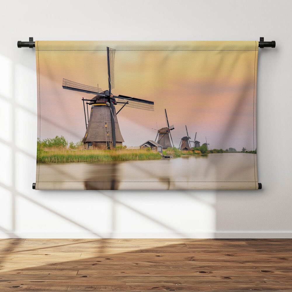 Windmolens in Kinderdijk bij zonsondergang