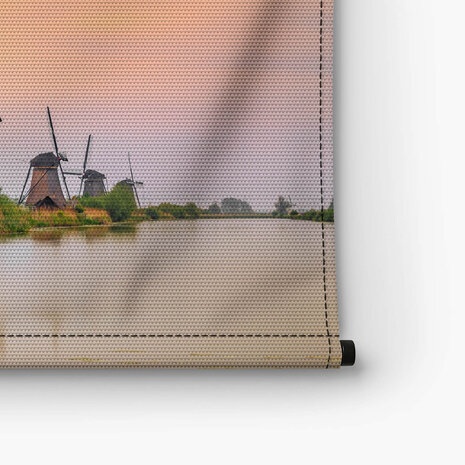 Windmolens in Kinderdijk bij zonsondergang