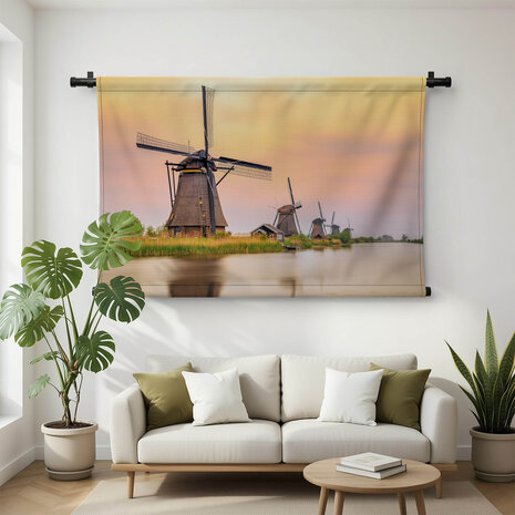 Windmolens in Kinderdijk bij zonsondergang