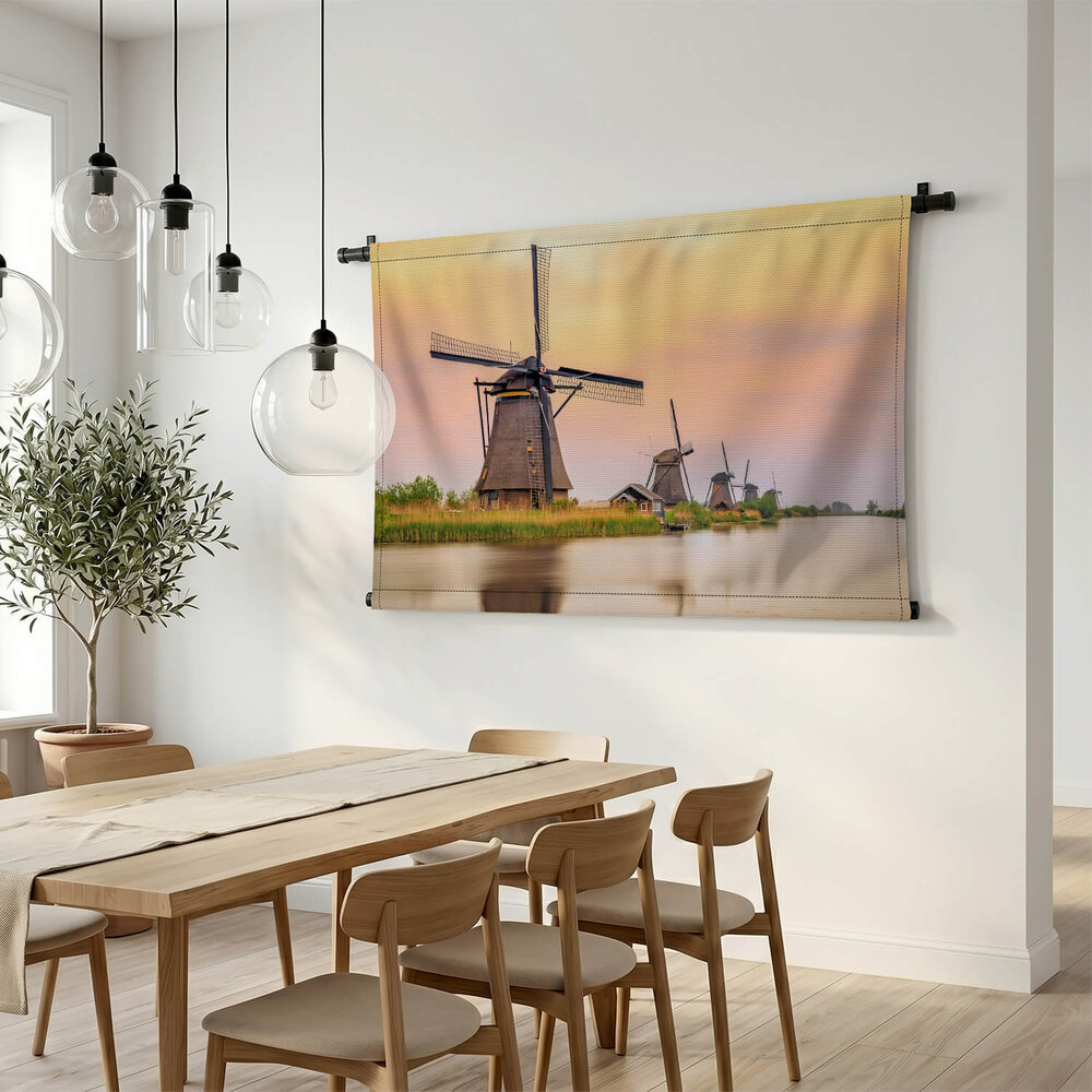 Windmolens in Kinderdijk bij zonsondergang