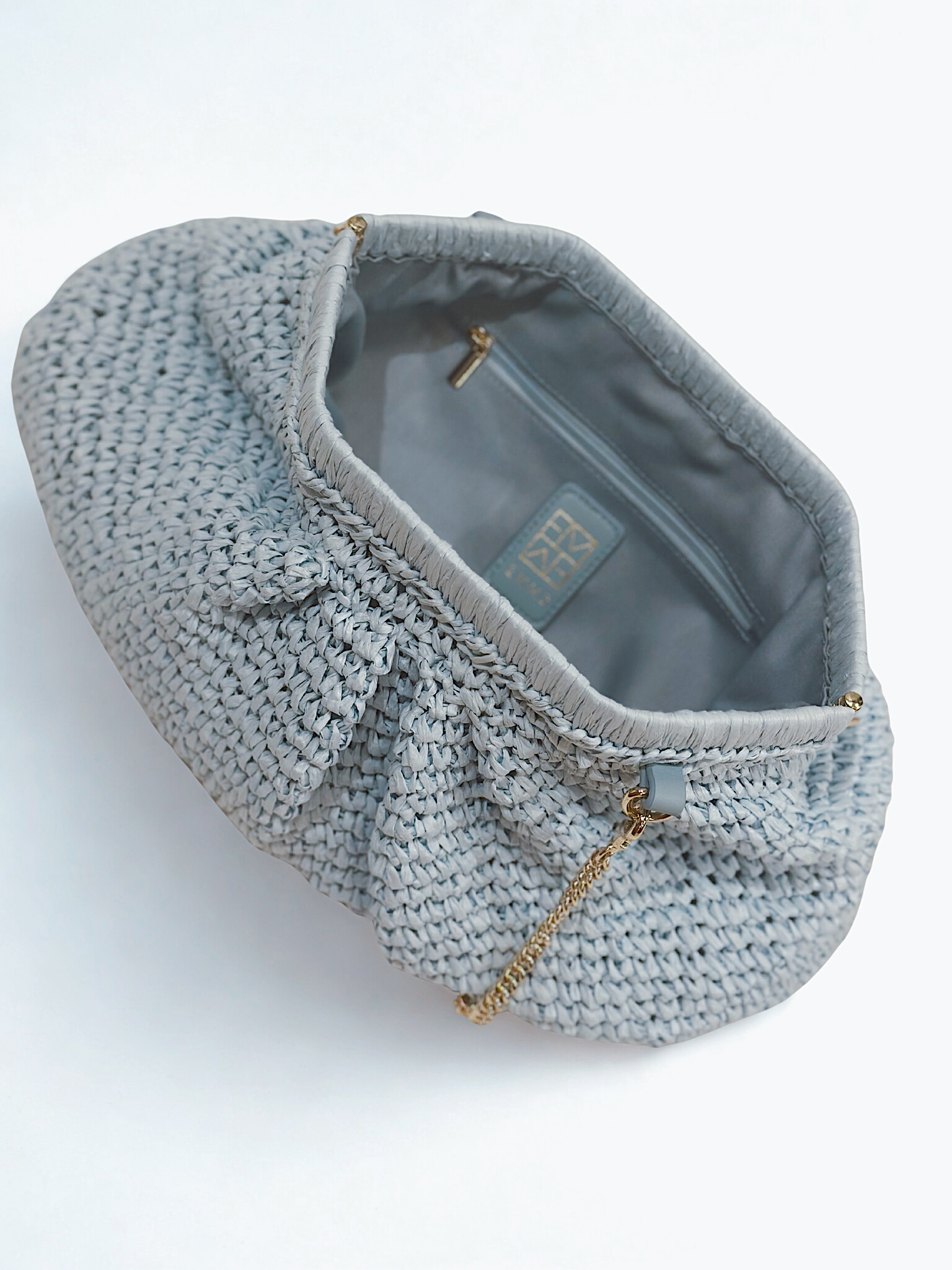 POCHETTE EN RAPHIA