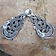 Silvered cloak clasp with Midgard snake