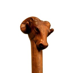 Wooden walking stick with rams head