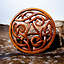 Wood carving Celtic triskelion