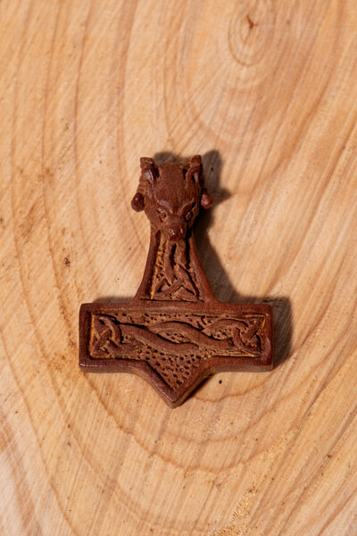 Wooden pendant Thor's hammer with ram's head