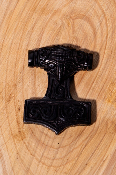 Wooden Viking Thor's hammer with face, black