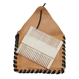 Medieval bone comb with leather bag