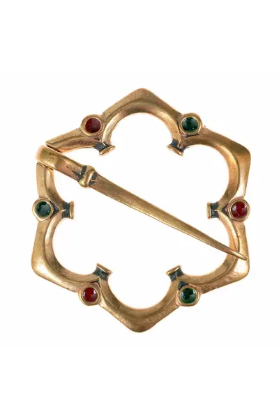 Medieval fibula with glass inlay