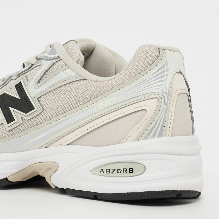 New Balance U7406KY Timberwolf/Black