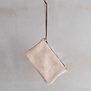 Koeienhuid clutch - Champagne