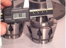 Sold: Crawford manual key operated hydraulic collet chuck with wide range multibore collets set