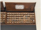Collection of Vintage Watchmaker Watch Crowns in Wooden Box