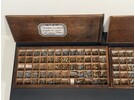 Collection of Vintage Watchmaker Watch Crowns in Wooden Box